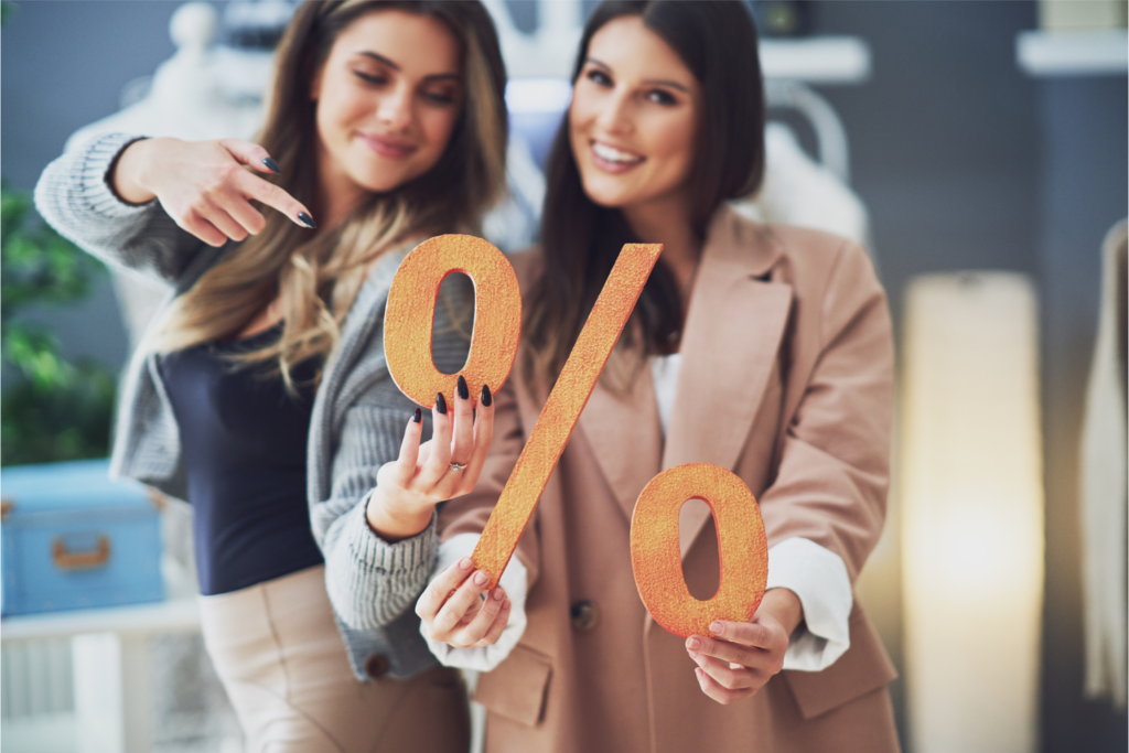 Ontario mortgage rates update for December 2025 – women holding a percentage sign representing interest rates.