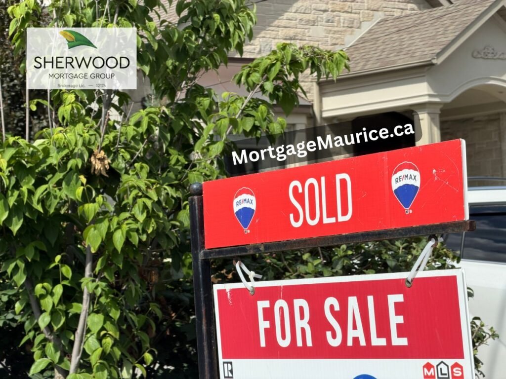 Sold and For Sale real estate sign in front of a Toronto-area home, reflecting changing housing market conditions.