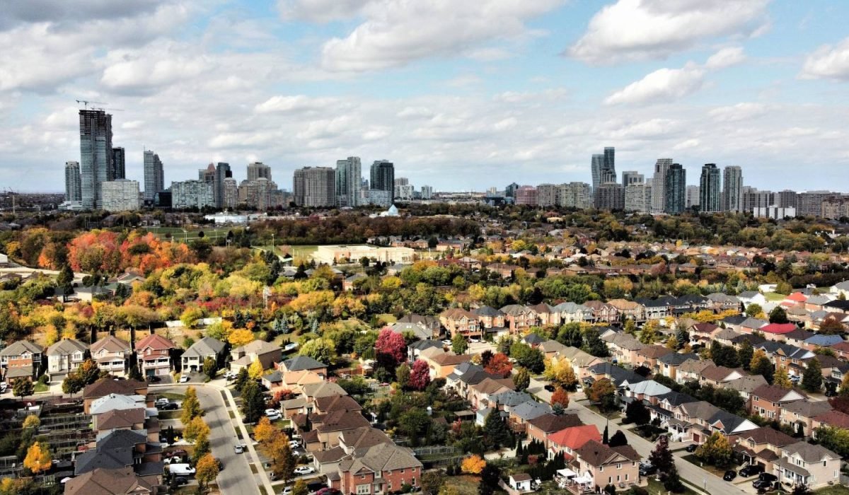 Ontario homes under clear sky representing 2025–2026 mortgage rate cuts and housing market trends.